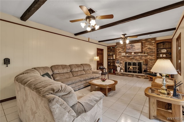 6182 Townline Rd, Wheatfield, NY 14094 - tiled living room with ceiling fan, beam ceiling, built in shelves, and a brick fireplace