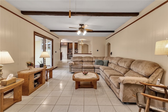 6182 Townline Rd, Wheatfield, NY 14094 - living room featuring arched walkways, ceiling fan, light tile patterned floors, and beamed ceiling
