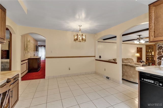 6182 Townline Rd, Wheatfield, NY 14094 - unfurnished dining area with light tile patterned floors, arched walkways, a ceiling fan, and a chandelier