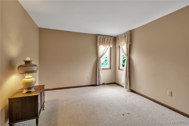 6182 Townline Rd, Wheatfield, NY 14094 - spare room with light colored carpet and baseboards