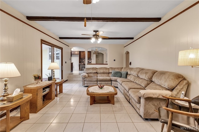 6182 Townline Rd, Wheatfield, NY 14094 - living area with arched walkways, ceiling fan, light tile patterned floors, and beamed ceiling