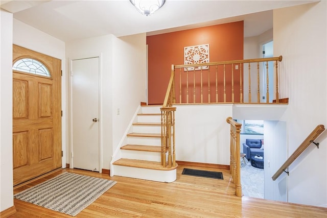 16 Clearview Dr, Henrietta, NY 14534 - foyer entrance with wood finished floors and stairs