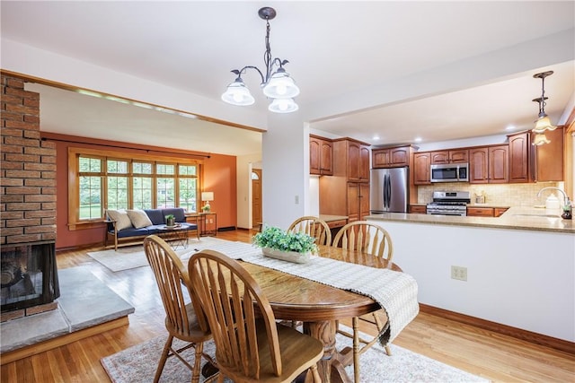 16 Clearview Dr, Henrietta, NY 14534 - dining room with a chandelier and light wood-type flooring