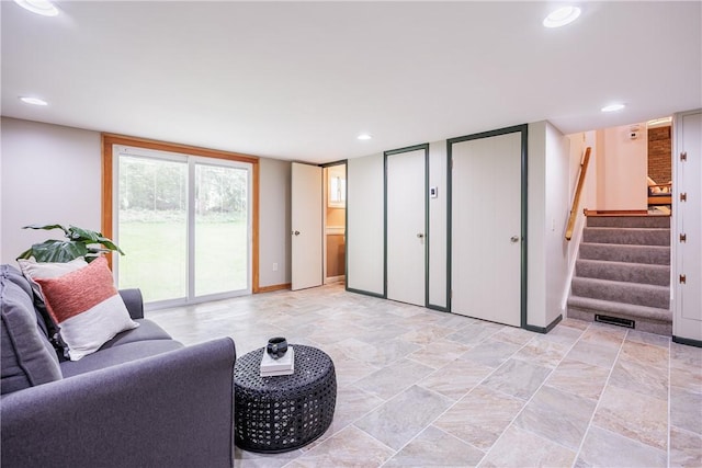 16 Clearview Dr, Henrietta, NY 14534 - living area featuring stairway, recessed lighting, and light stone finish flooring