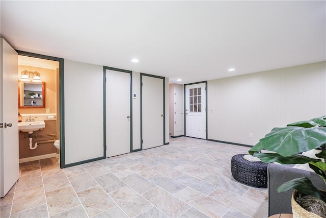 16 Clearview Dr, Henrietta, NY 14534 - living area with light stone finish flooring and recessed lighting