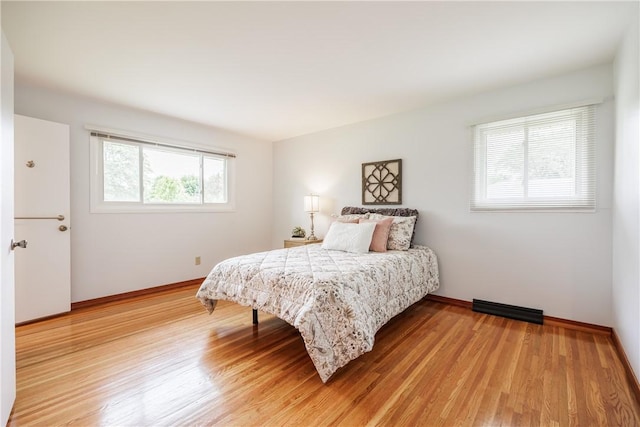 16 Clearview Dr, Henrietta, NY 14534 - bedroom featuring light wood-style floors and baseboards