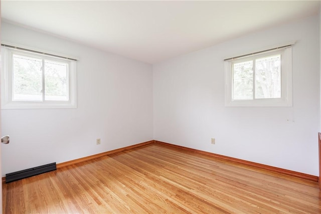 16 Clearview Dr, Henrietta, NY 14534 - empty room featuring plenty of natural light and light wood-type flooring