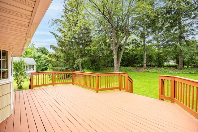 16 Clearview Dr, Henrietta, NY 14534 - deck featuring a lawn and view of wooded area