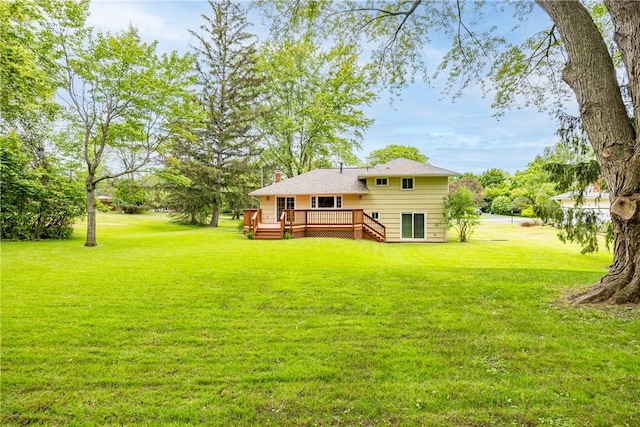 16 Clearview Dr, Henrietta, NY 14534 - view of green lawn featuring a deck