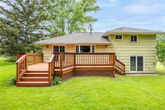 16 Clearview Dr, Henrietta, NY 14534 - rear view of house featuring a chimney, a yard, a shingled roof, and a deck