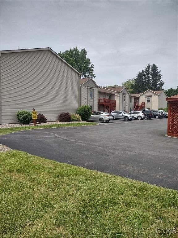 407 Fultz Dr, Oneida-Inside, NY 13421 - view of home's exterior featuring uncovered parking