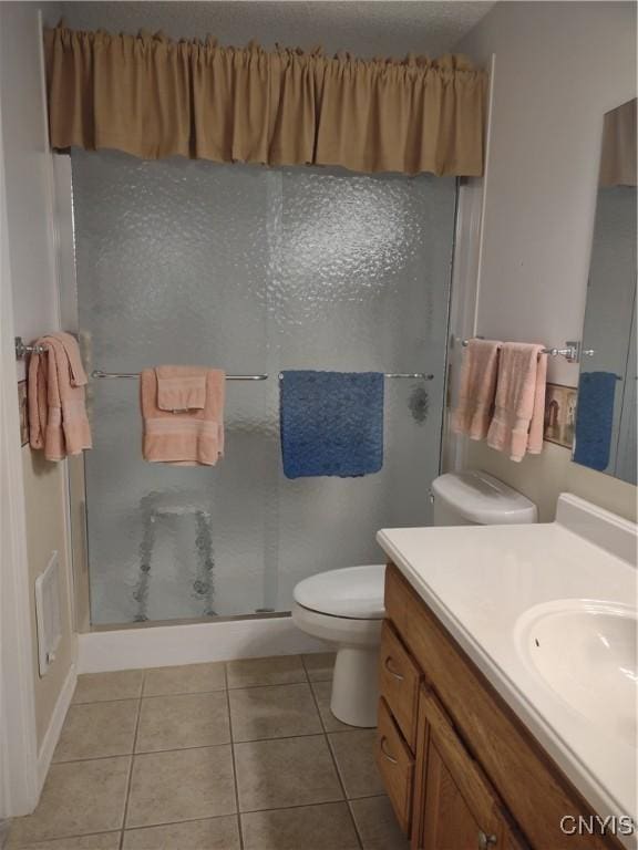 407 Fultz Dr, Oneida-Inside, NY 13421 - bathroom with tile patterned flooring, vanity, and a stall shower