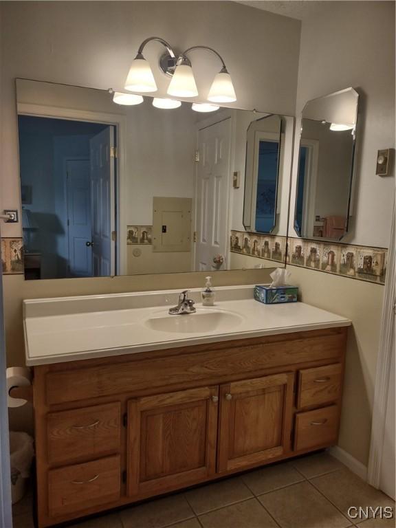 407 Fultz Dr, Oneida-Inside, NY 13421 - bathroom featuring tile patterned flooring and vanity