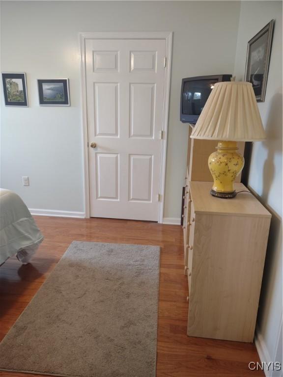 407 Fultz Dr, Oneida-Inside, NY 13421 - bedroom featuring wood finished floors