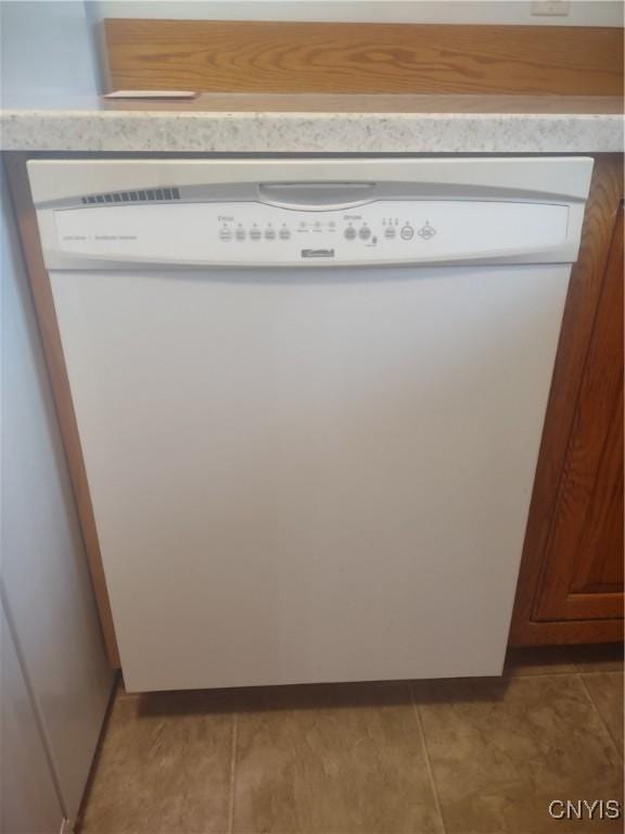 407 Fultz Dr, Oneida-Inside, NY 13421 - kitchen view of white dishwasher and light countertops