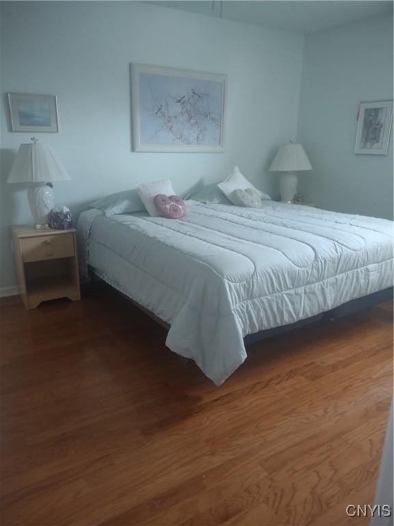 407 Fultz Dr, Oneida-Inside, NY 13421 - bedroom featuring wood finished floors