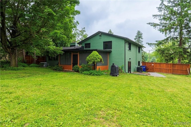 4535 Ransom Rd, Clarence, NY 14031 - rear view of house featuring a sunroom