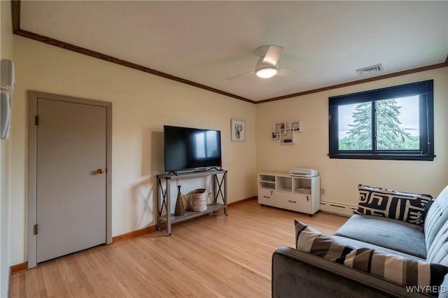 4535 Ransom Rd, Clarence, NY 14031 - living room with baseboard heating, crown molding, light wood finished floors, and ceiling fan