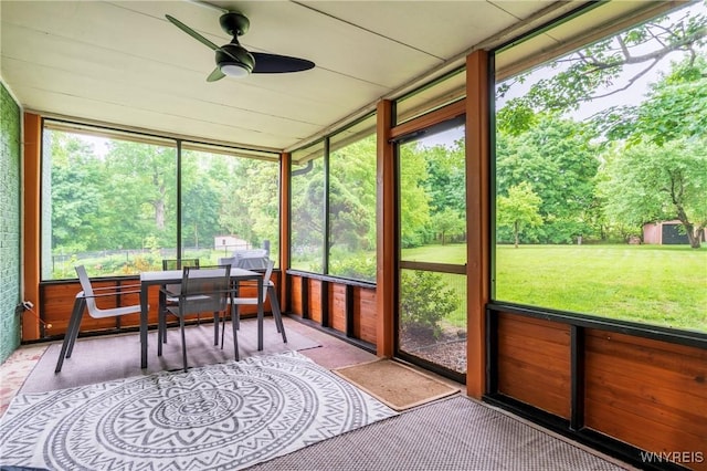 4535 Ransom Rd, Clarence, NY 14031 - sunroom featuring a ceiling fan and outdoor dining area