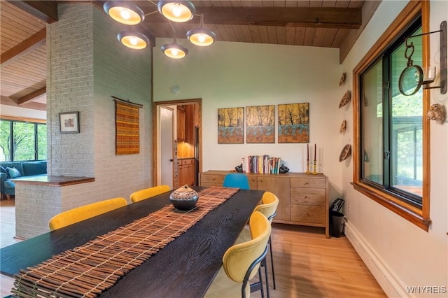 4535 Ransom Rd, Clarence, NY 14031 - dining room featuring a wooden ceiling with exposed beams, light wood-type flooring, and high vaulted ceiling