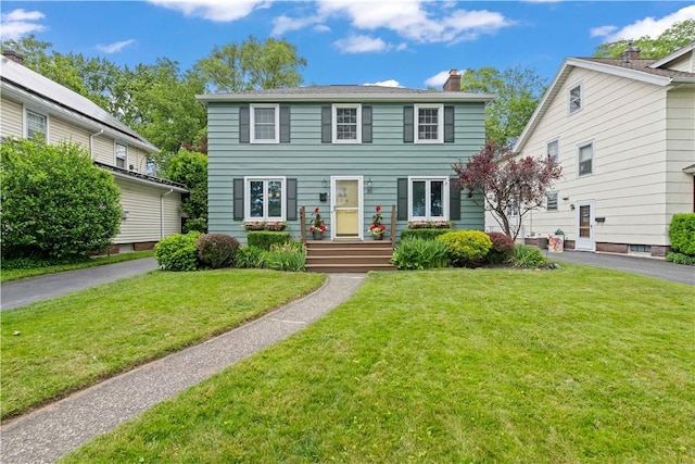 30 Northfield Rd, Irondequoit, NY 14617 - colonial inspired home with a chimney and a front lawn