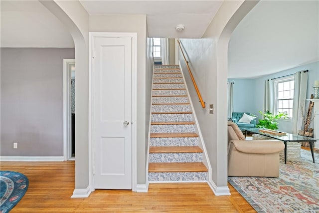 30 Northfield Rd, Irondequoit, NY 14617 - stairway with arched walkways and wood finished floors