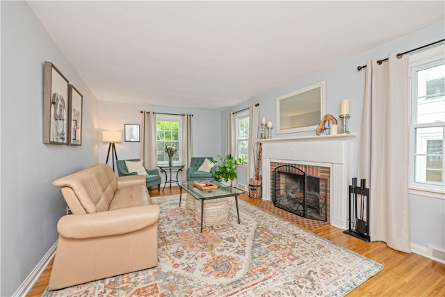 30 Northfield Rd, Irondequoit, NY 14617 - living room with a brick fireplace and wood finished floors