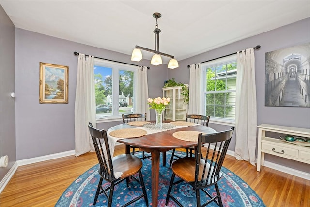 30 Northfield Rd, Irondequoit, NY 14617 - dining space with light wood-type flooring and baseboards