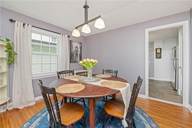 30 Northfield Rd, Irondequoit, NY 14617 - dining area featuring light wood finished floors and baseboards
