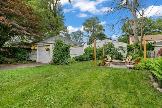 30 Northfield Rd, Irondequoit, NY 14617 - view of yard with an outdoor fire pit and a garage
