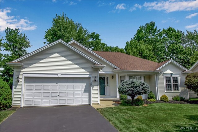 139 Autumn Creek Ct, Amherst, NY 14051 - ranch-style home with asphalt driveway, a garage, and a front lawn