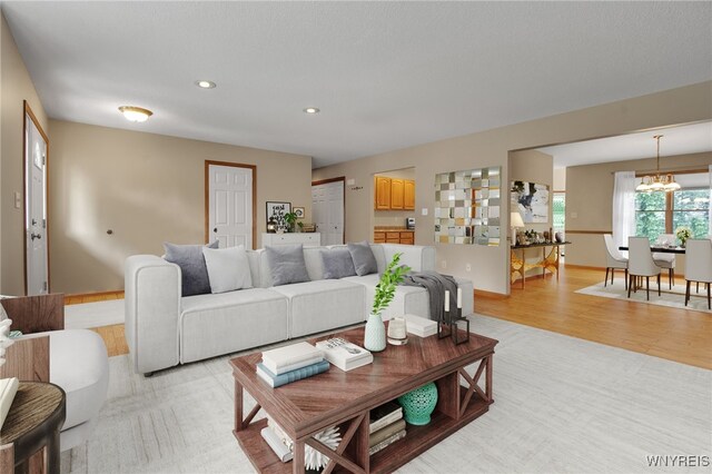 139 Autumn Creek Ct, Amherst, NY 14051 - living area featuring a chandelier, light wood-type flooring, and recessed lighting