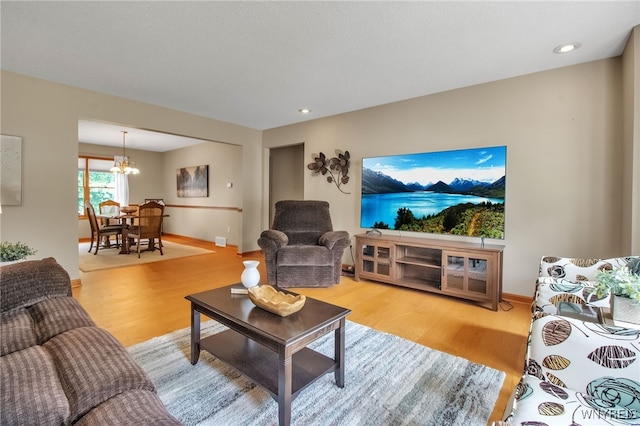 139 Autumn Creek Ct, Amherst, NY 14051 - living room featuring light wood-style flooring, a chandelier, and recessed lighting