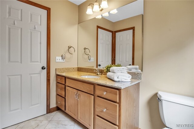 139 Autumn Creek Ct, Amherst, NY 14051 - bathroom featuring vanity, tile patterned floors, and a chandelier