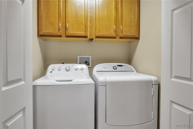139 Autumn Creek Ct, Amherst, NY 14051 - washroom with washing machine and clothes dryer and cabinet space