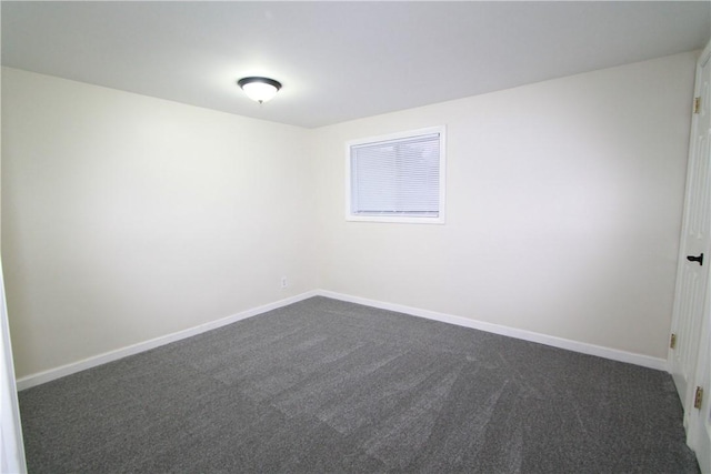 556 Middle Rd, Henrietta, NY 14467 - spare room featuring dark colored carpet and baseboards