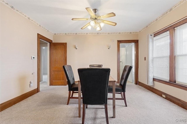 344 S Collingwood Ave, Syracuse, NY 13206 - dining space with light colored carpet and ceiling fan