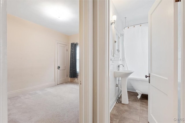 344 S Collingwood Ave, Syracuse, NY 13206 - bathroom with baseboards and a shower with shower curtain