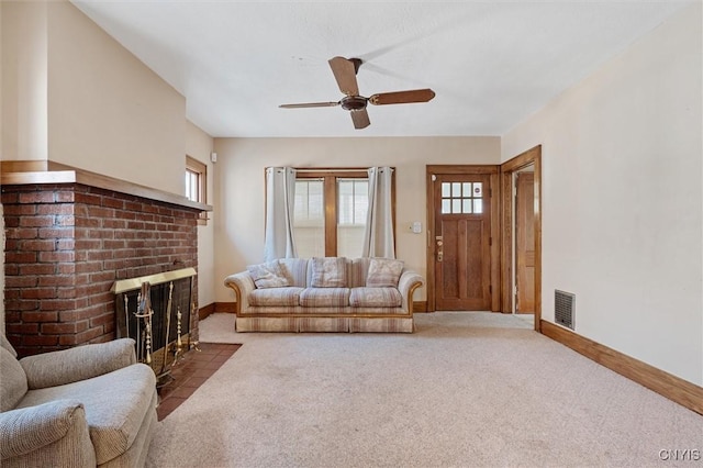 344 S Collingwood Ave, Syracuse, NY 13206 - living area with a fireplace, carpet floors, a ceiling fan, and healthy amount of natural light