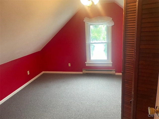 205 Morton St, Syracuse, NY 13204 - additional living space featuring baseboard heating, lofted ceiling, carpet flooring, and ceiling fan