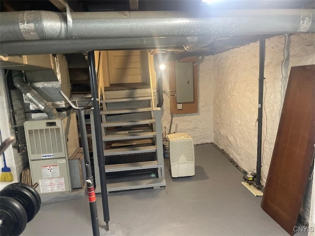 205 Morton St, Syracuse, NY 13204 - unfinished basement with electric panel and a textured wall