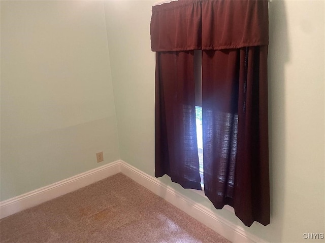 205 Morton St, Syracuse, NY 13204 - carpeted empty room with baseboards