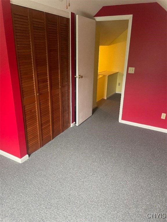 205 Morton St, Syracuse, NY 13204 - hallway with carpet flooring and lofted ceiling