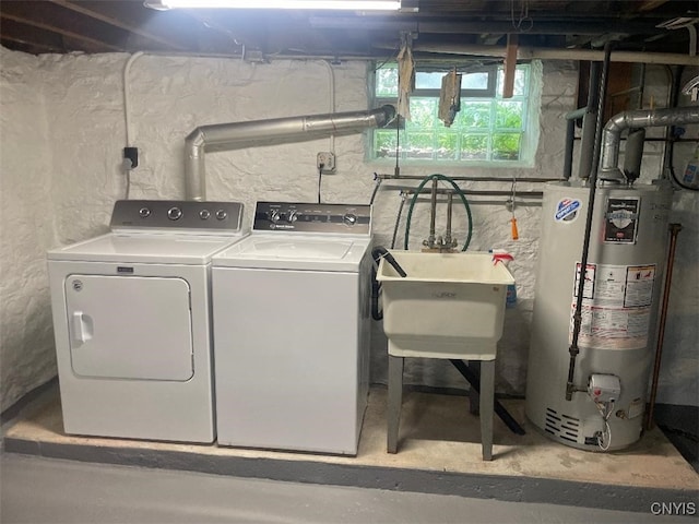 205 Morton St, Syracuse, NY 13204 - washroom featuring water heater, separate washer and dryer, and a textured wall