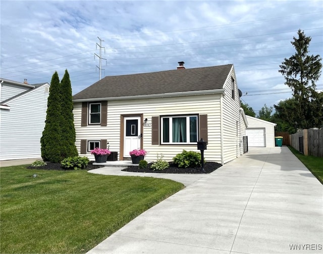 4947 Morgan Pkwy, Hamburg, NY 14075 - view of front of property featuring a detached garage, a chimney, and a shingled roof