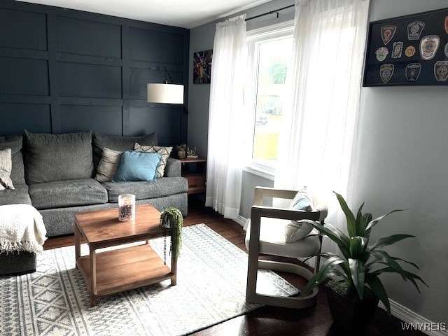 4947 Morgan Pkwy, Hamburg, NY 14075 - living room featuring baseboards and wood finished floors