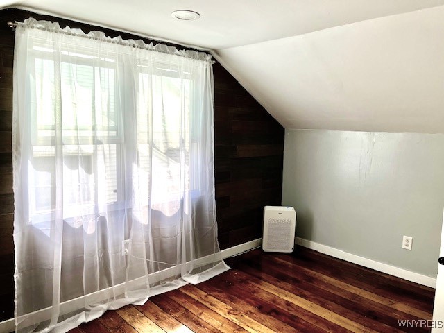 4947 Morgan Pkwy, Hamburg, NY 14075 - bonus room featuring dark wood-style flooring and vaulted ceiling