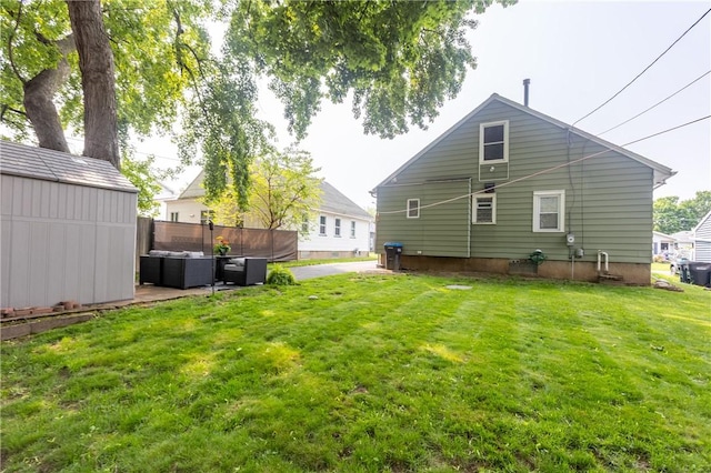 94 Birchwood Dr, Irondequoit, NY 14622 - rear view of house featuring outdoor lounge area, a patio area, and an outdoor structure