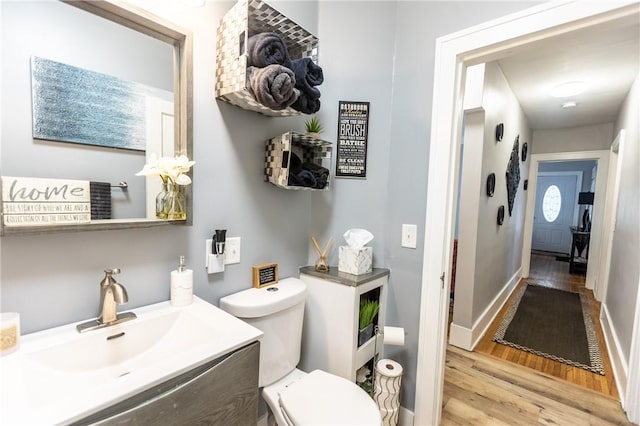 94 Birchwood Dr, Irondequoit, NY 14622 - half bath featuring wood finished floors and vanity