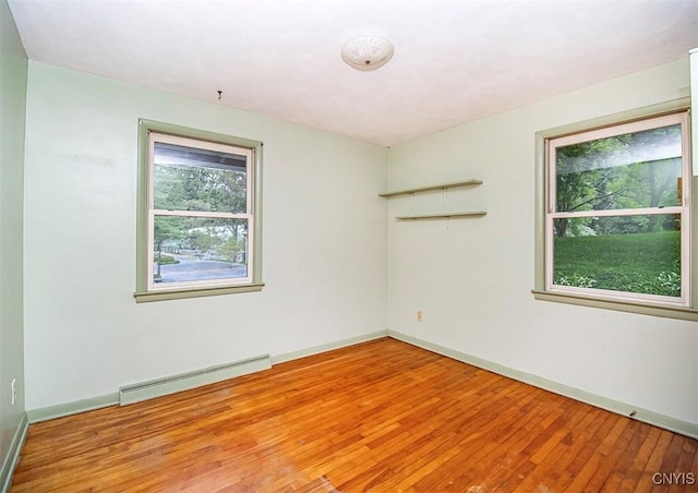 3959 Number Nine Rd, Cazenovia, NY 13035 - spare room featuring baseboard heating and wood-type flooring